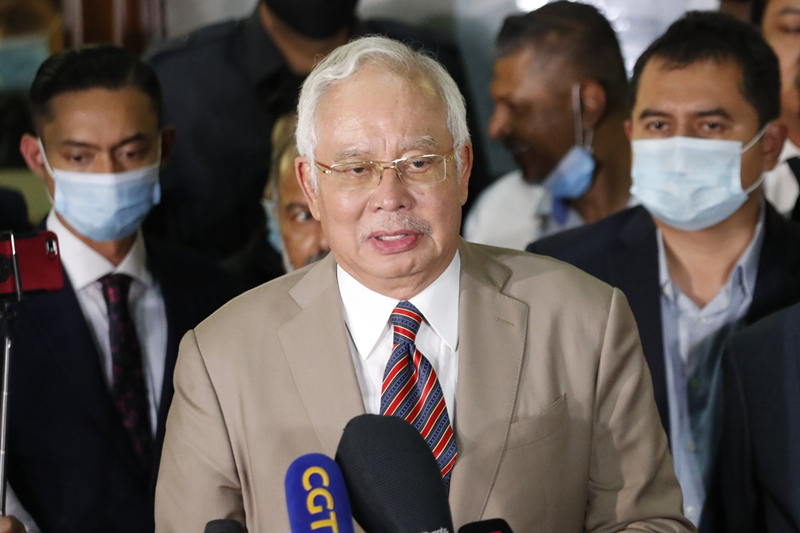Malaysian ex-PM Najib given 12 years in jail in 1MDB scandal